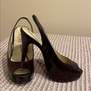 Sling back peep toe heels.